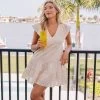 HENRIETTA EYELET FLUTTER SLEEVE MINI DRESS 1 HENRIETTA EYELET FLUTTER SLEEVE MINI DRESS -Style Vibe Shop 10 Flag Anthem Tampa 2092
